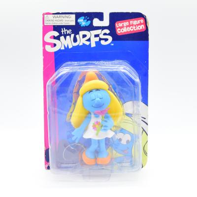 Фигурка the Smurfs Smurfette в белом платье с цветком (SMF0178)