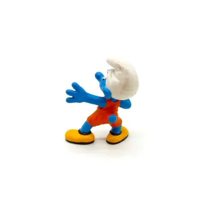 Фигурка Schleich Смурфик толкатель ядра 20742